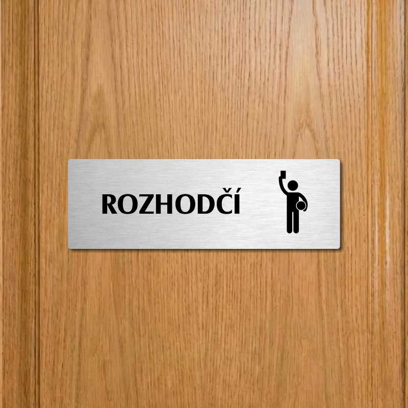 Rozhodčí, 240x79mm, zlatá popiska s ozdobou uprostřed